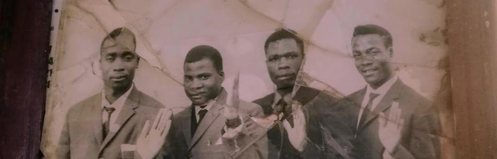 Billede af fire af mændene fra Malawi. 