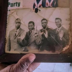 Billede af fire af mændene fra Malawi. 